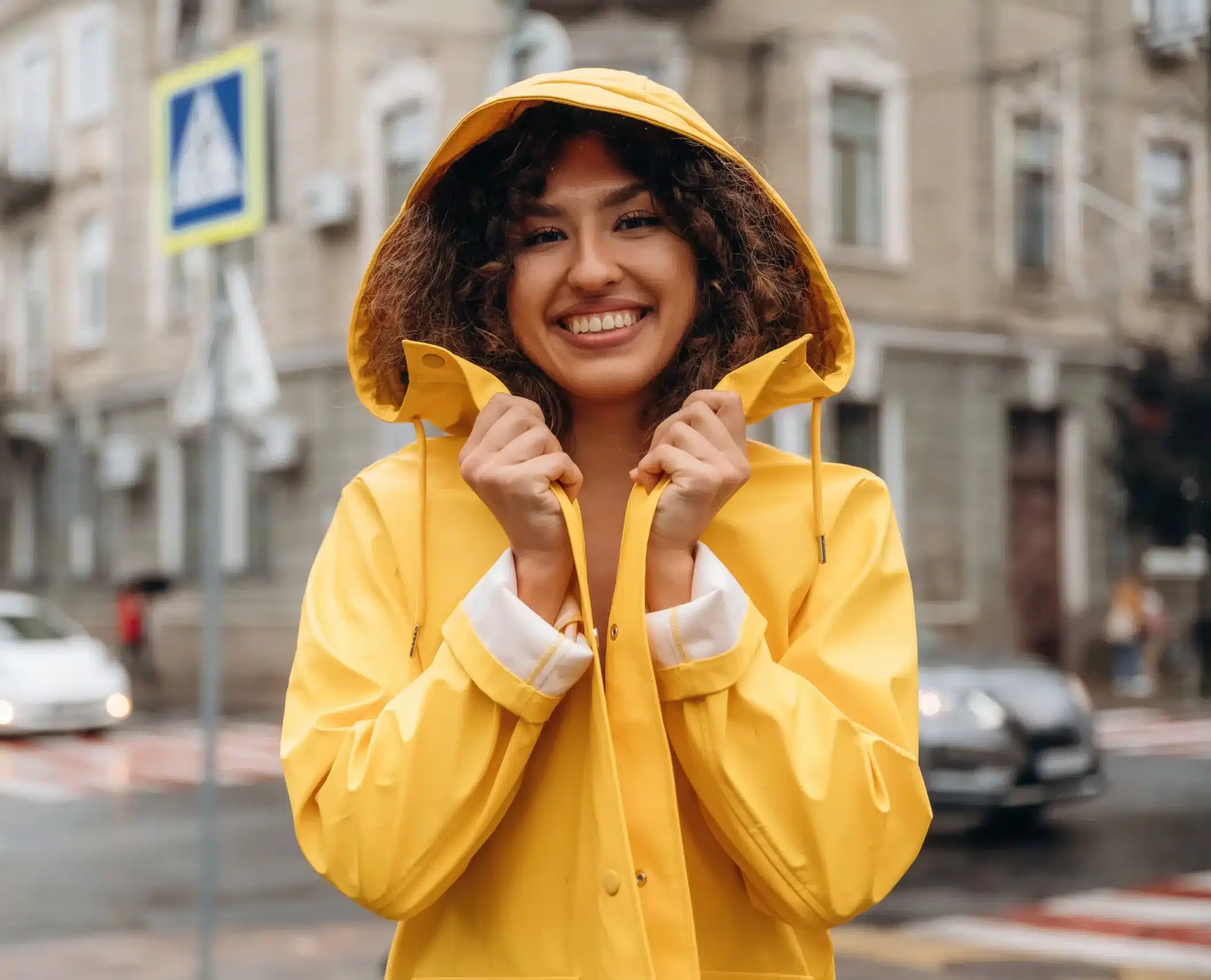 Smiling woman outdoors, representing confidence and healthy lifestyle
